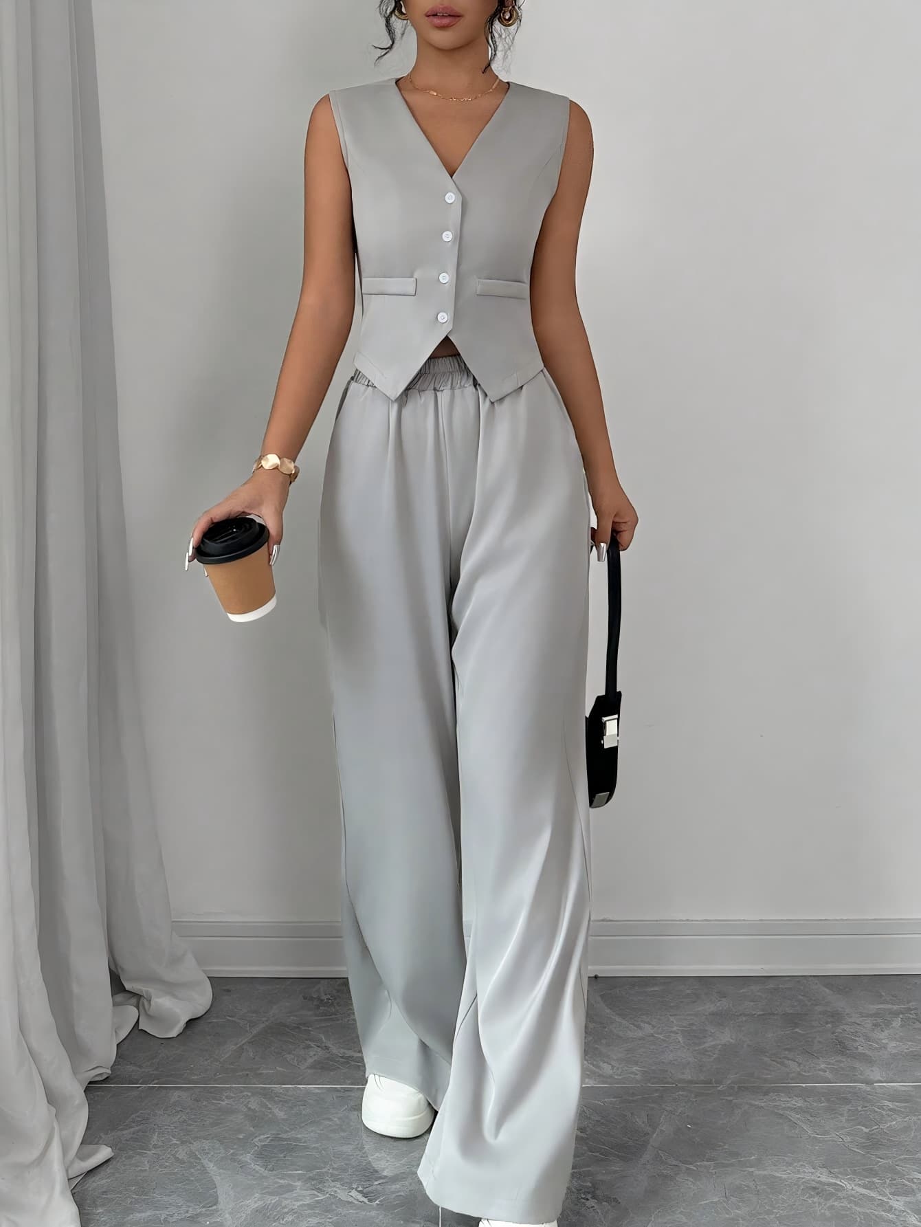 Conjunto elegante de chaleco sin mangas y pantalones