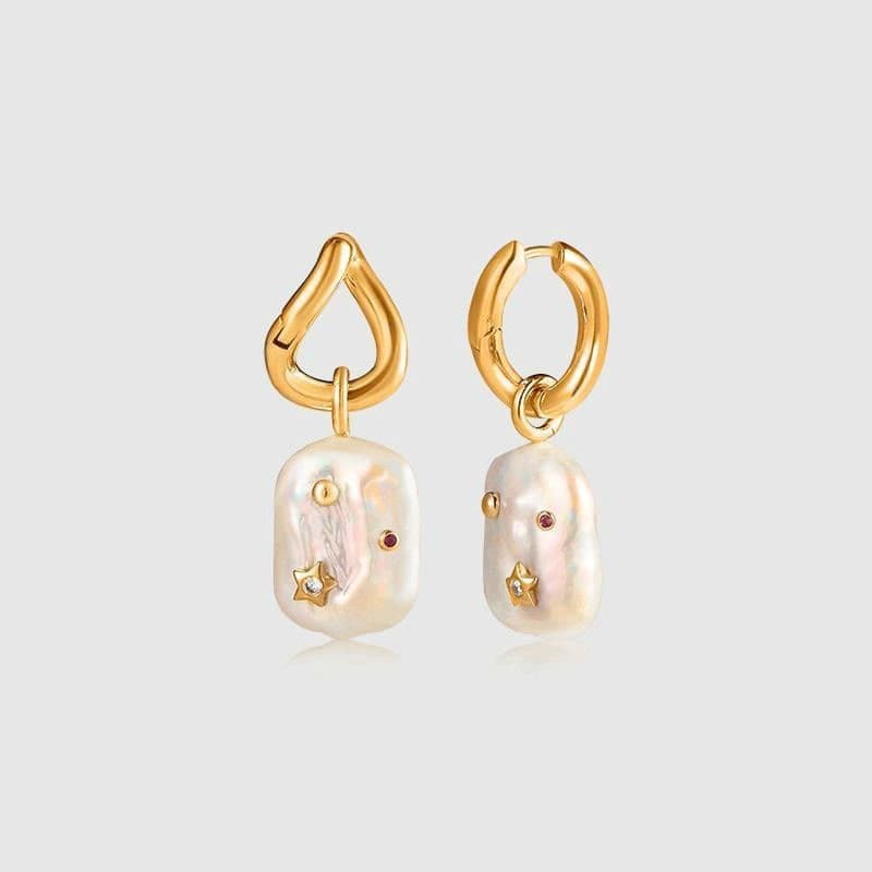 Aretes de perla barroca con circón forma U