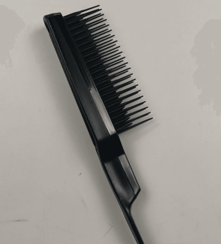 Peine de peluquería con diseño esponjoso