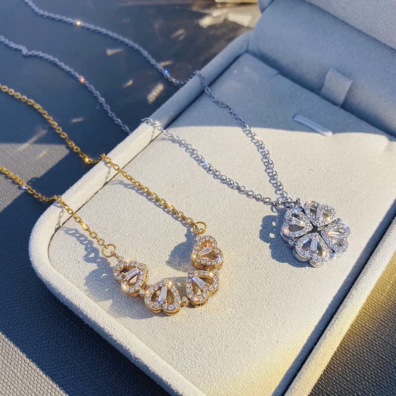 Collar magnético retráctil en forma de corazón y trébol de cuatro hojas