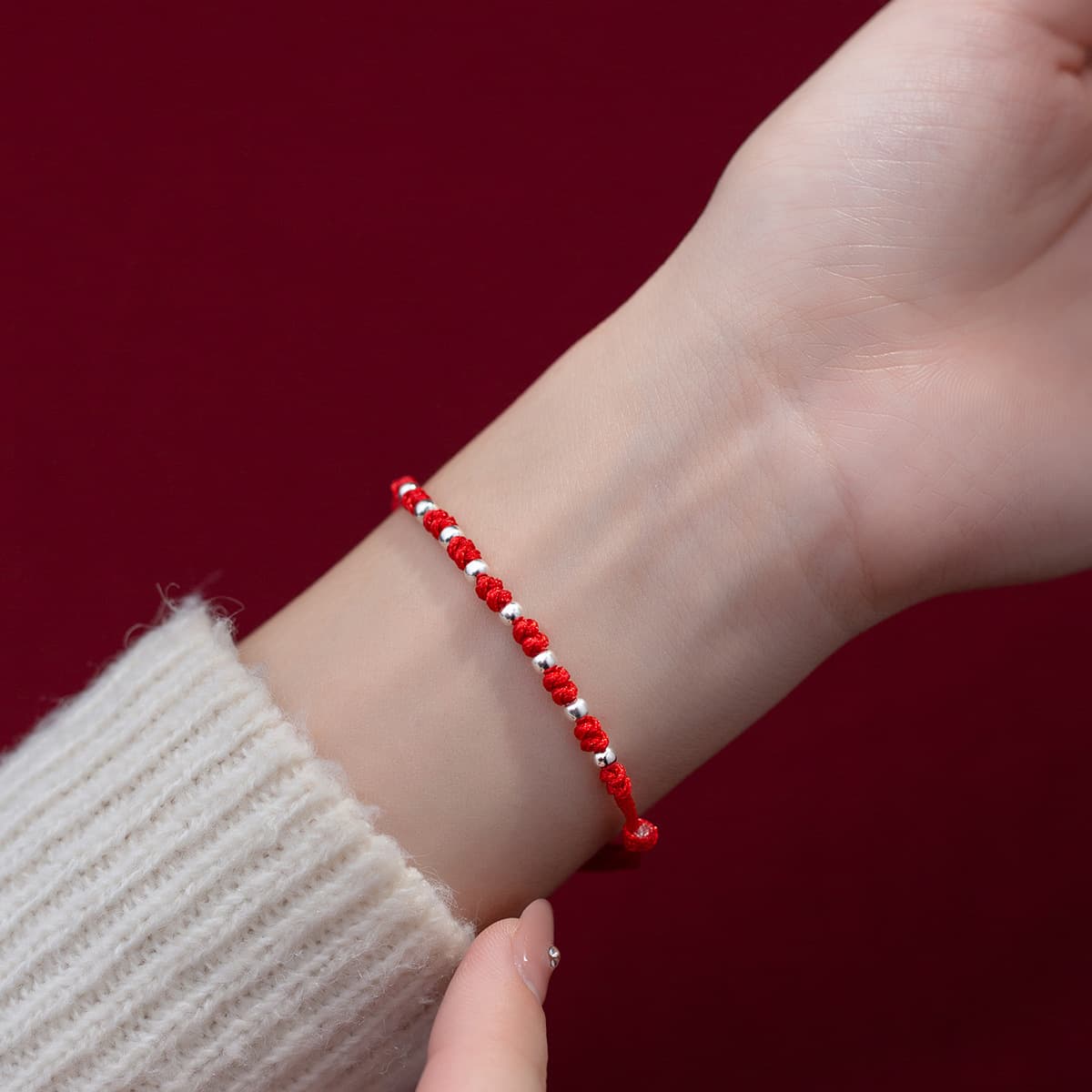 Pulsera de plata 925 tejida a mano con cuentas y cordón rojo