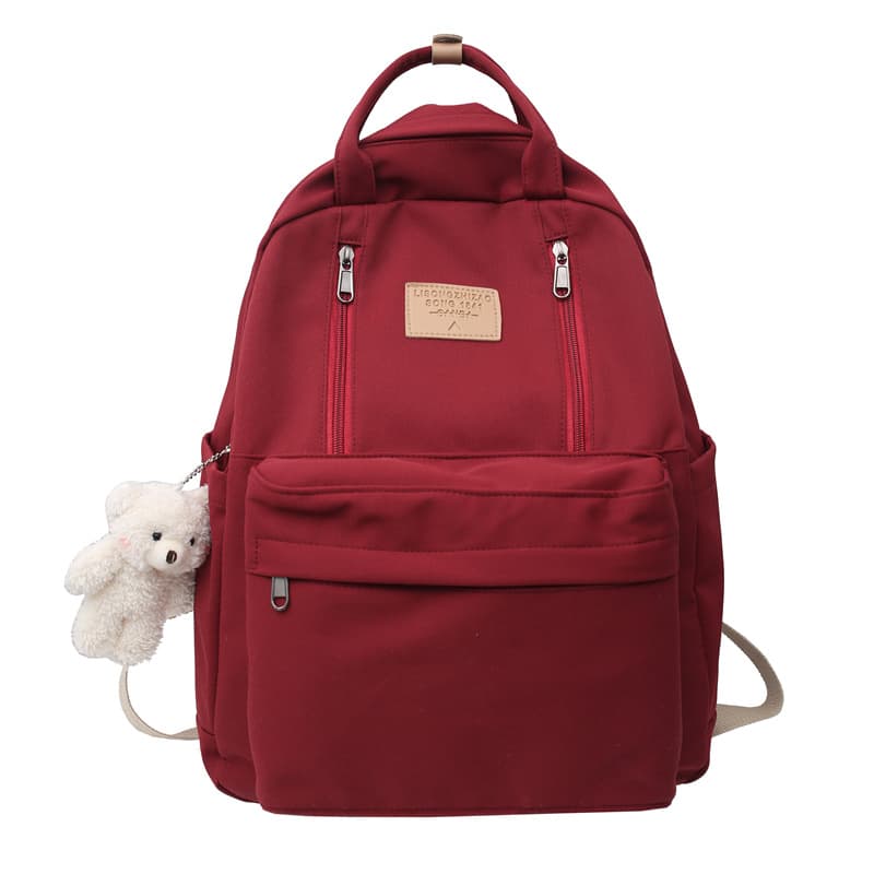 Mochila escolar con doble cierre y diseño versátil