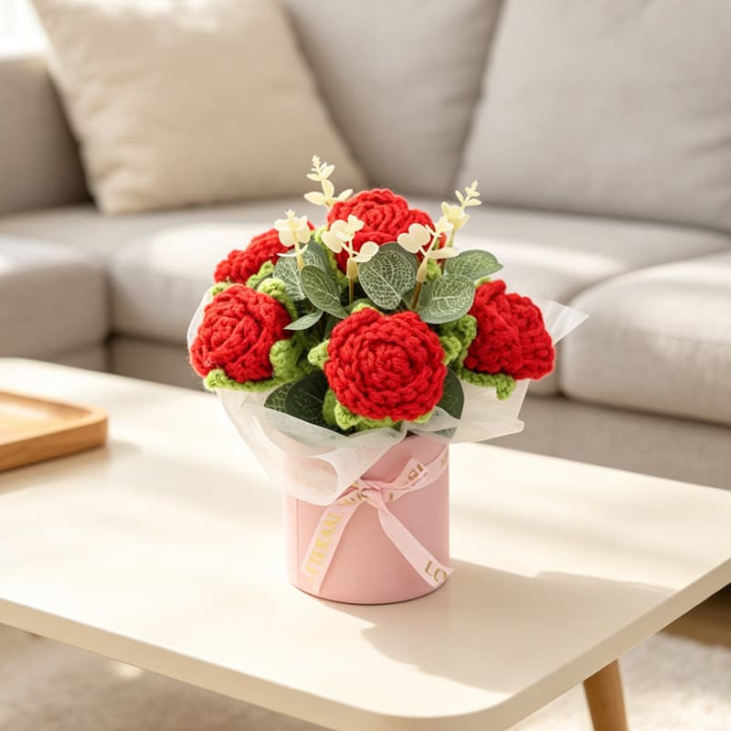 Ramo tejido de rosas rojas con hojas de eucalipto