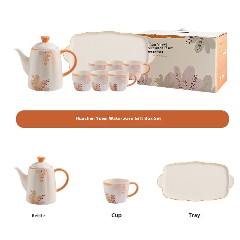 Juego de té de porcelana con tazas y hervidor