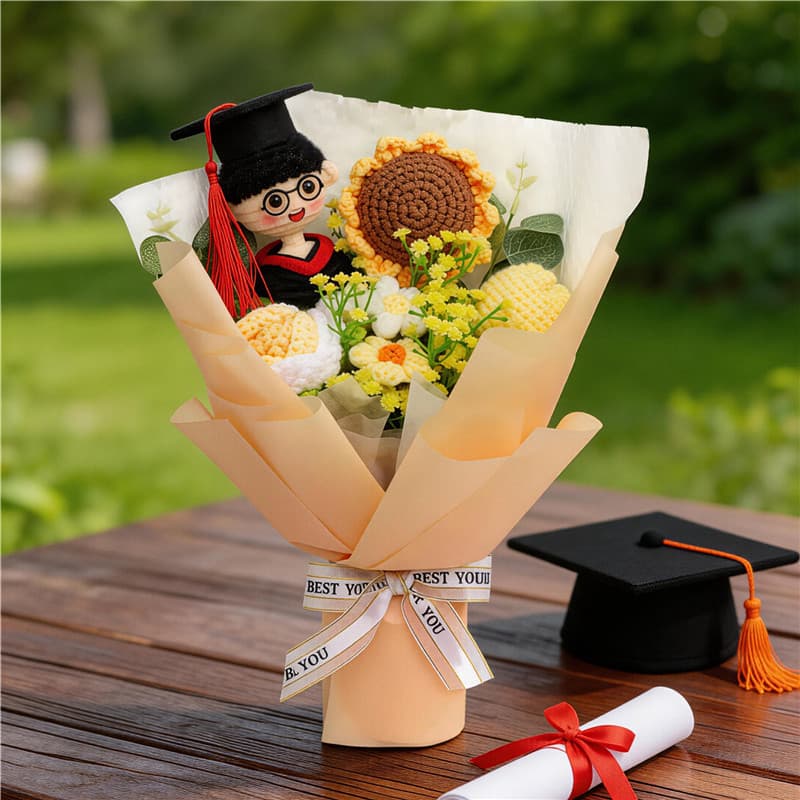 Ramo de flores con figurita de graduación tejidas a crochet