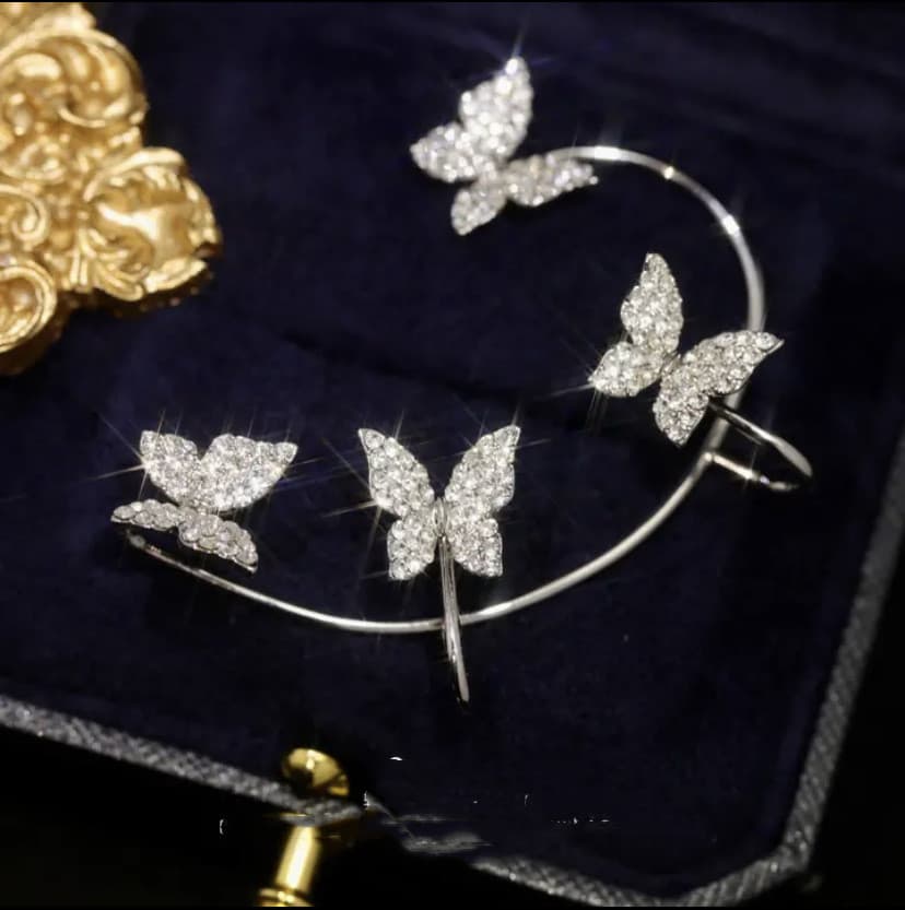 Aretes clip sin perforación con diseño de mariposa