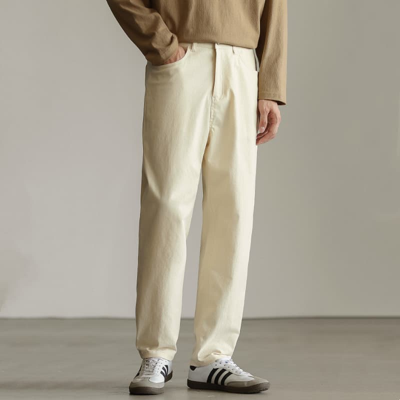 Pantalones denim stretch recortados de color sólido