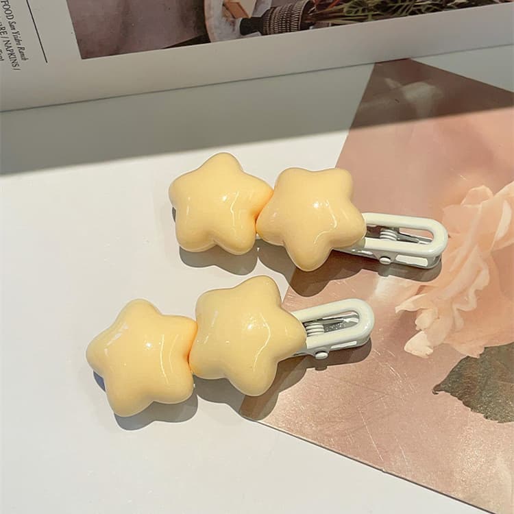 Pasador de cabello con forma de estrella amarilla