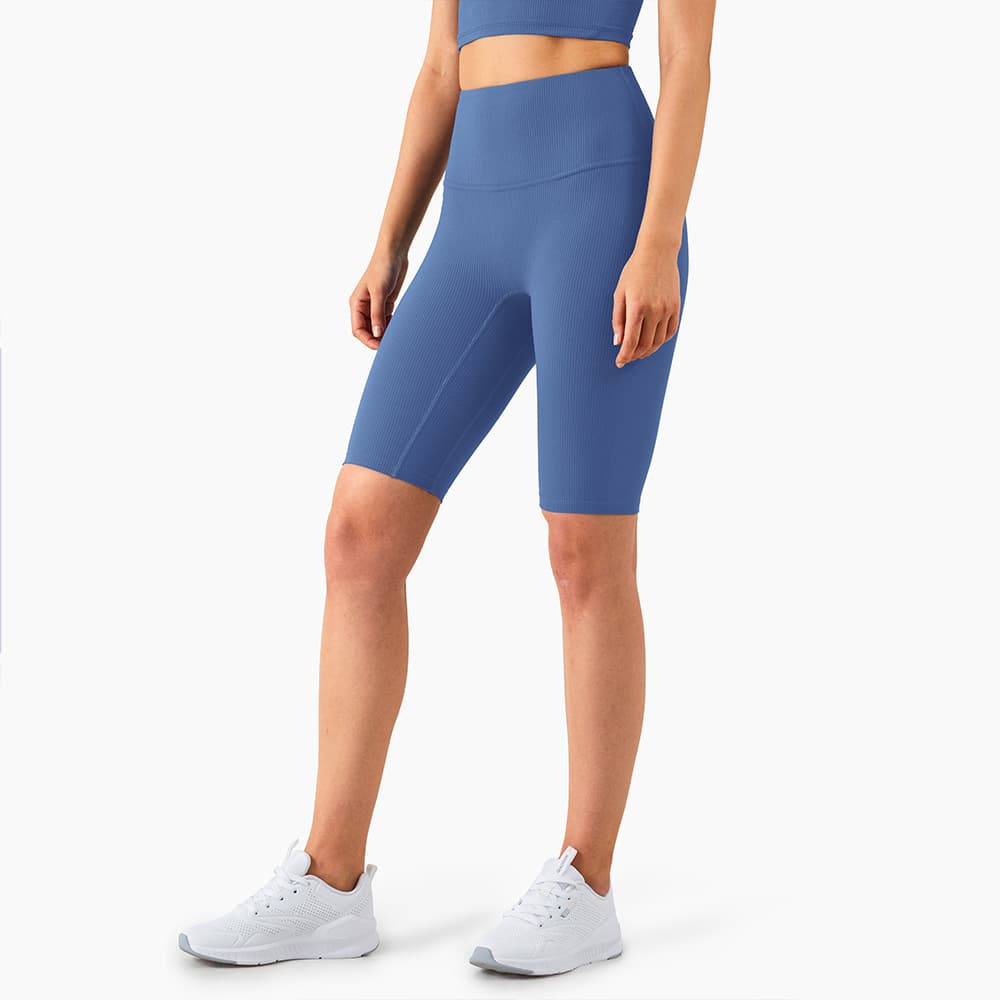 Shorts deportivos cinco puntos con efecto levantador