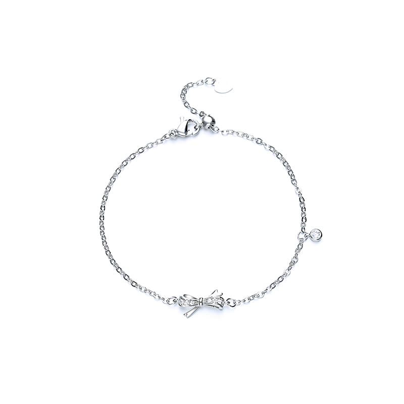 Pulsera de moño con diamantes, color oro blanco