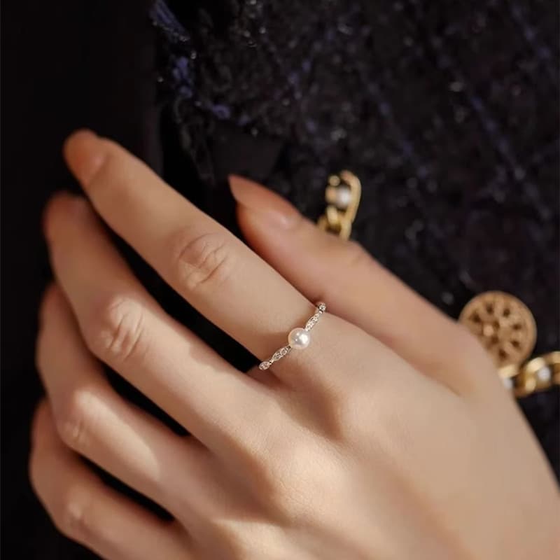 Anillo de plata esterlina con perlas ajustable