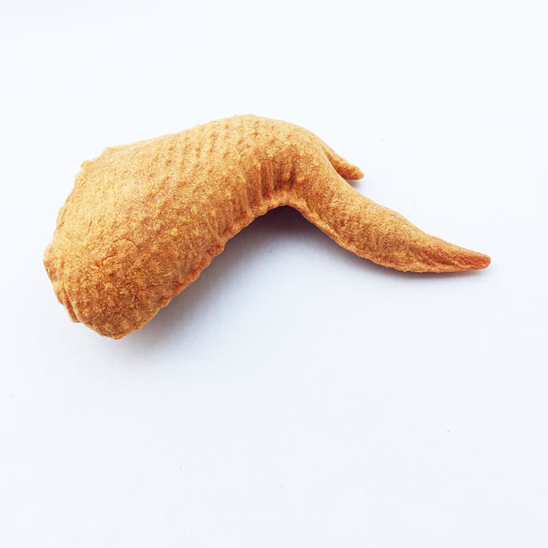 Juguete de pelúche con pata de pollo para perro