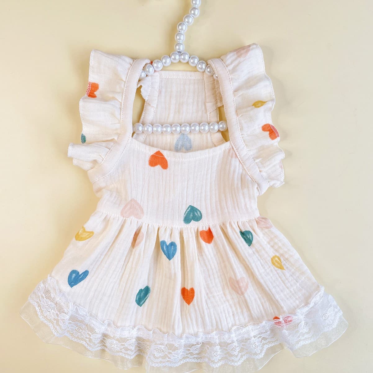 Vestido infantil de manga acampanada con diseño de corazón