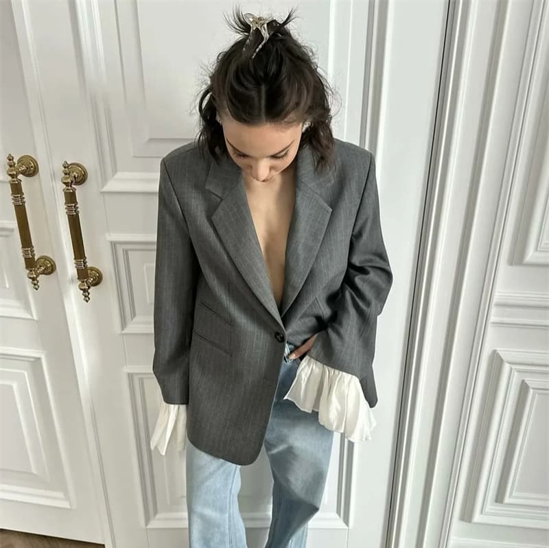 Saco de traje para mujer con solapa y botones