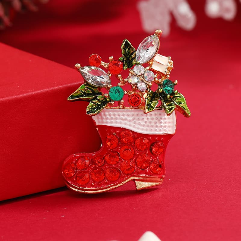 Broche navideño con incrustaciones de diamante de imitación
