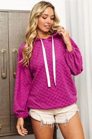 Suéter con capucha y patrón jacquard para mujer