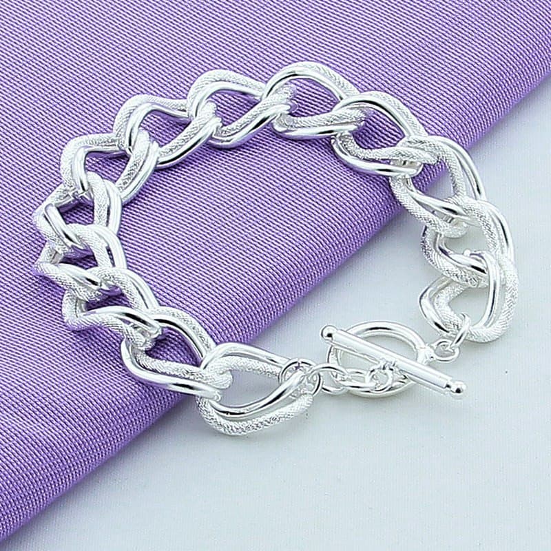Pulsera de aleación con acabado plateado