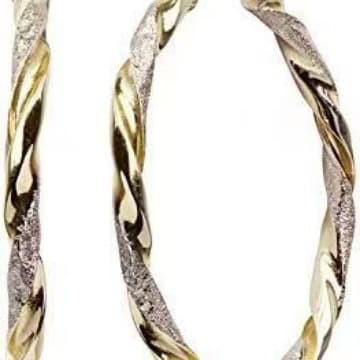 Aretes geométricos dorados en aleación