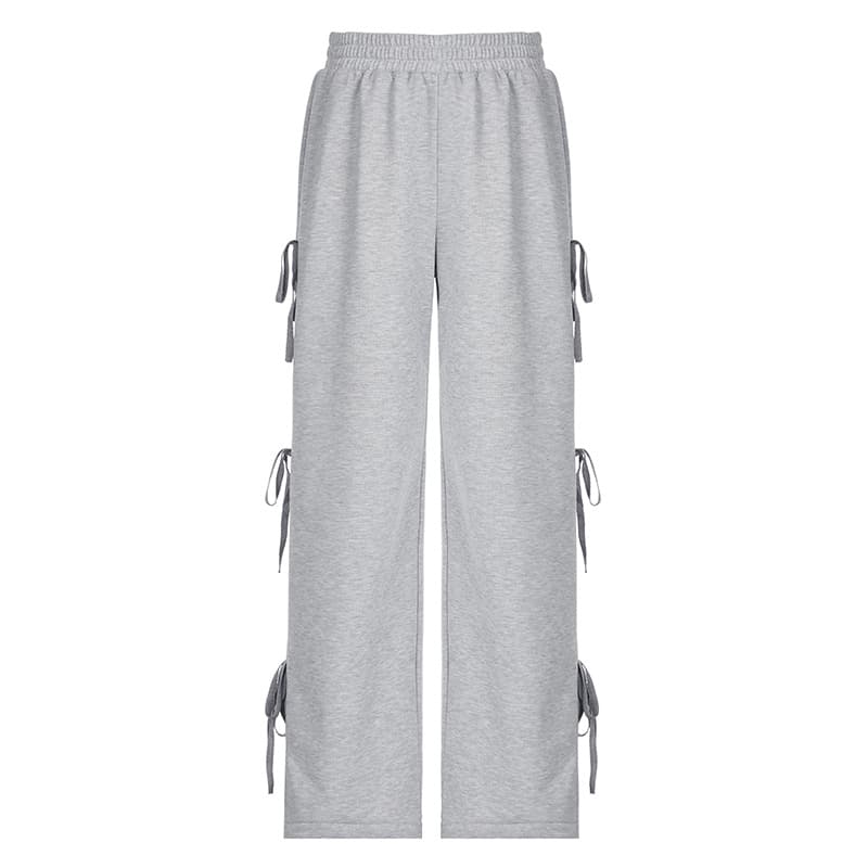 Pantalones deportivos sueltos con cintura elástica y moño lateral