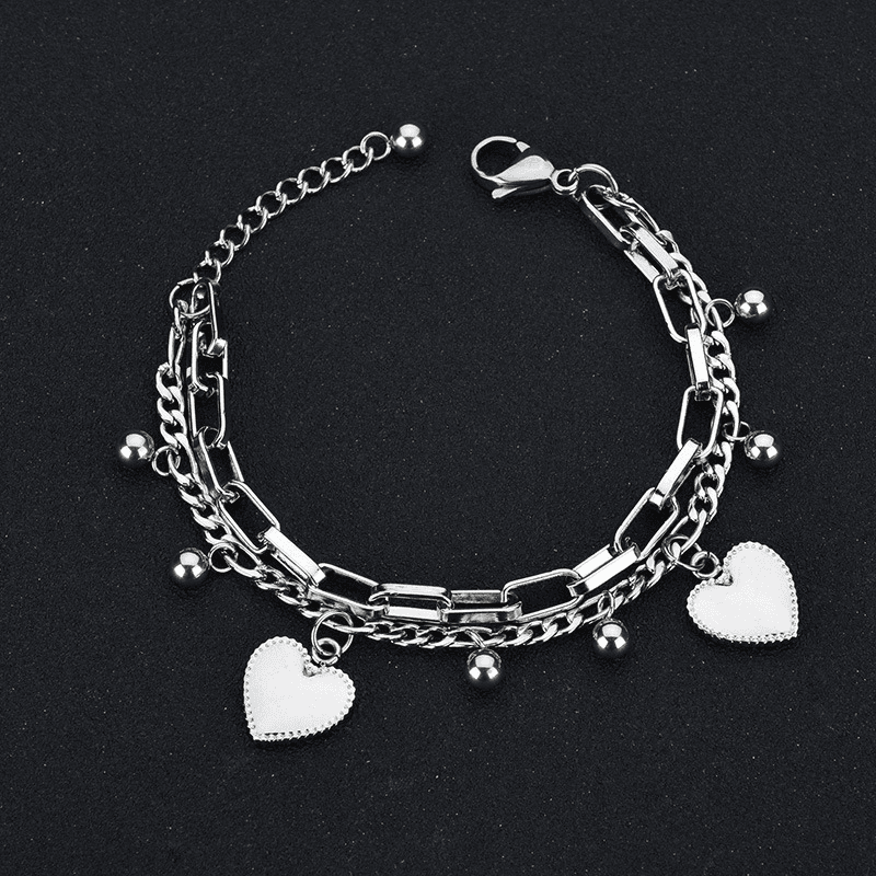 Pulsera de acero inoxidable con cadenas mixtas y dije de corazón