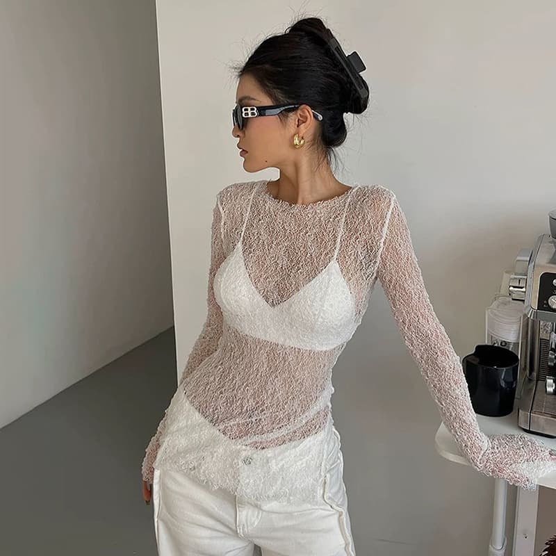Blusa para mujer de color sólido con diseño calado y manga larga