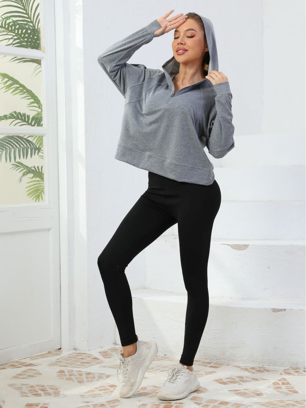 Sudadera con capucha y media cremallera para mujer