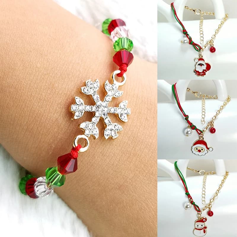 Pulsera de encanto navideño con muñeco y reno