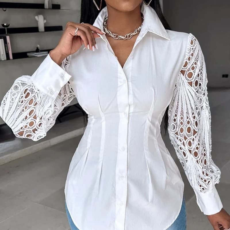 Blusa blanca manga larga con detalles de encaje