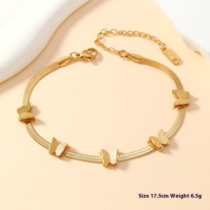 Pulsera de titanio con doble mariposa