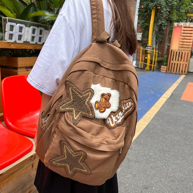 Mochila de lona con diseño geométrico para estudiantes