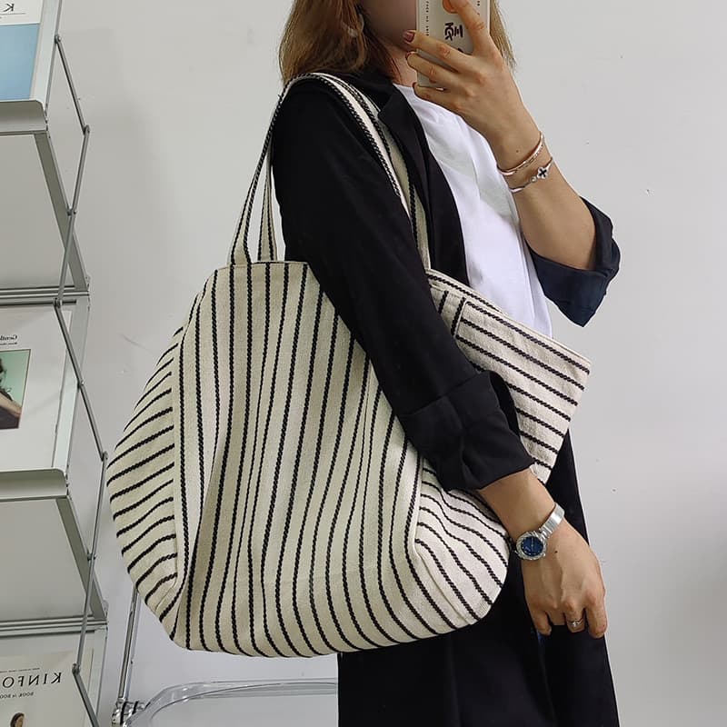 Bolsa de lona a rayas casual y versátil