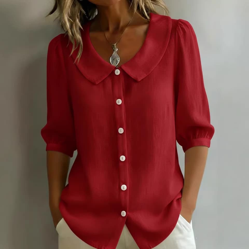 Blusa holgada con cuello y mangas cortas