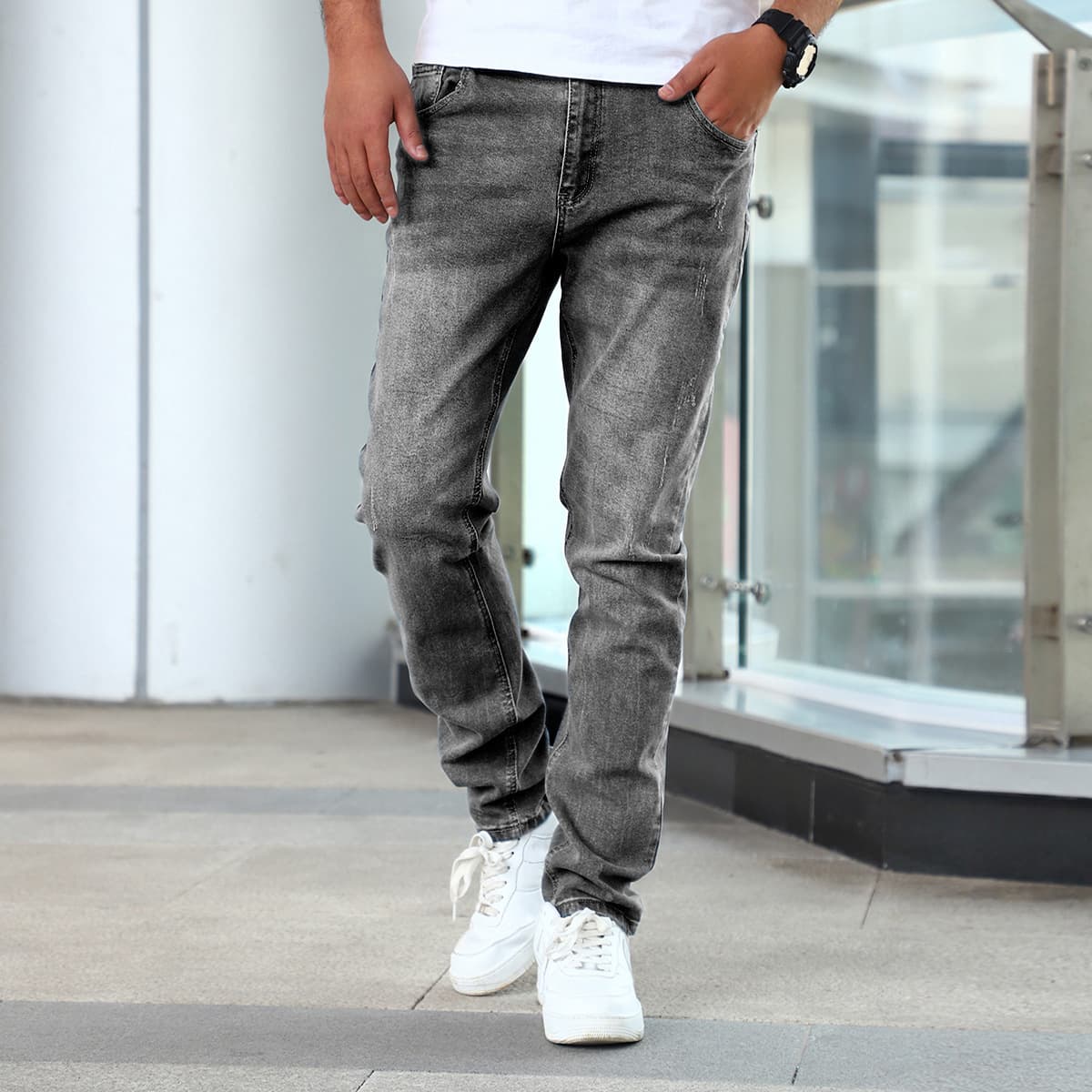 Pantalones vaqueros grises ajustados con elástico