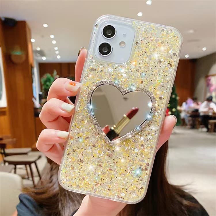 Funda espejo con forma de corazón y strass