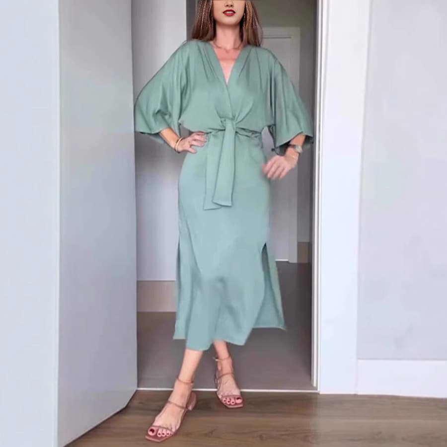 Vestido suelto de lino con escote en V y mangas murciélago
