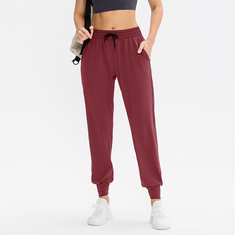 Pantalones para yoga elásticos con cordón ajustable y secado rápido