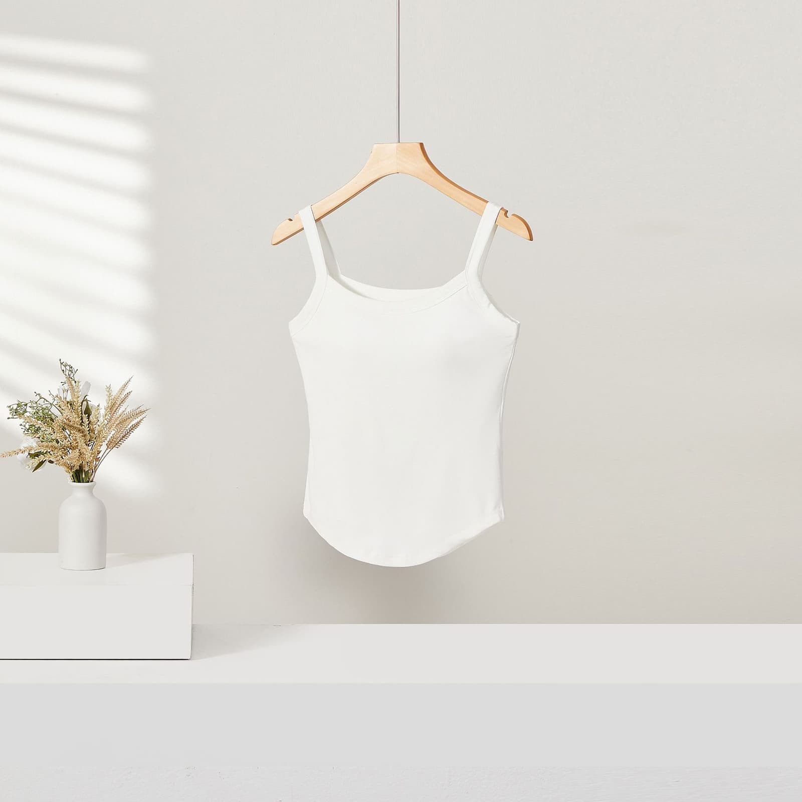 Camiseta corta slim con almohadilla y cobertura abdominal