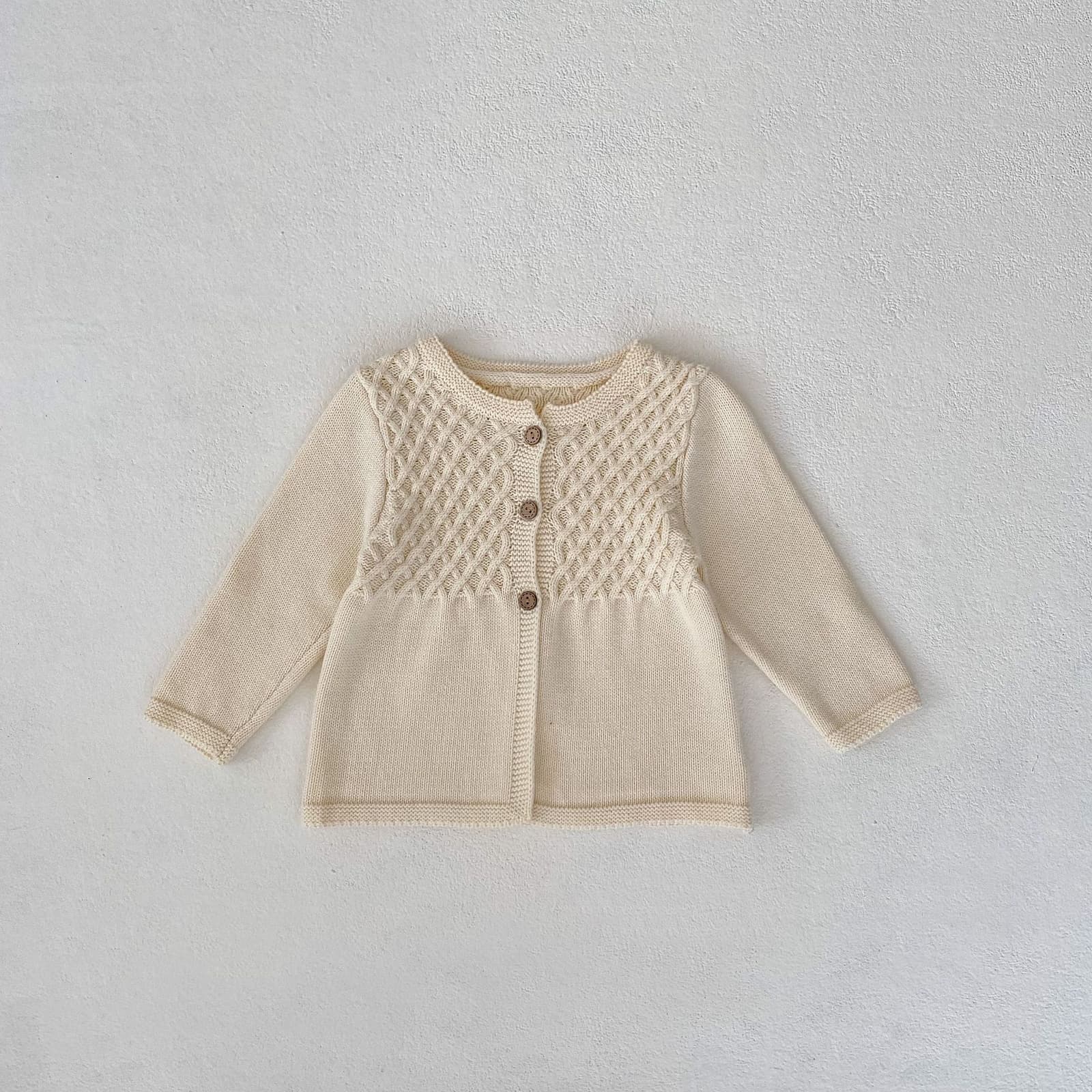 Chaqueta tejida jacquard diamante algodón bebé