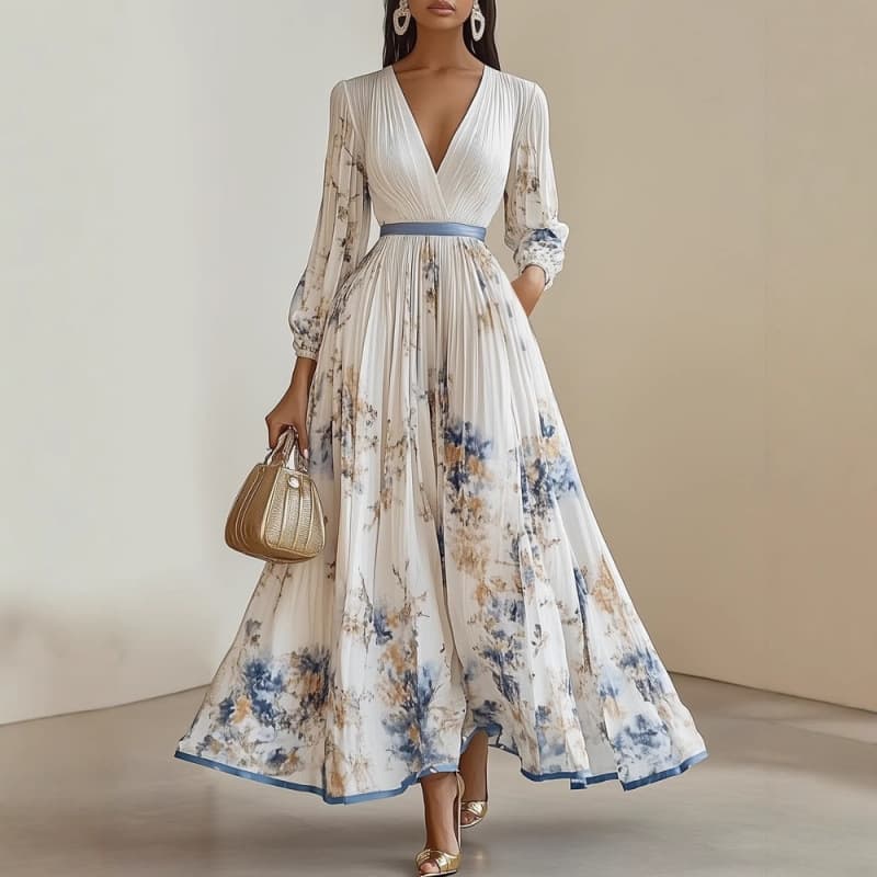 Vestido de vacaciones con estampado y pliegues