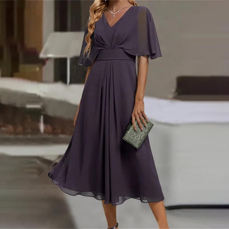 Vestido estilo swing con escote V y cintura ajustada