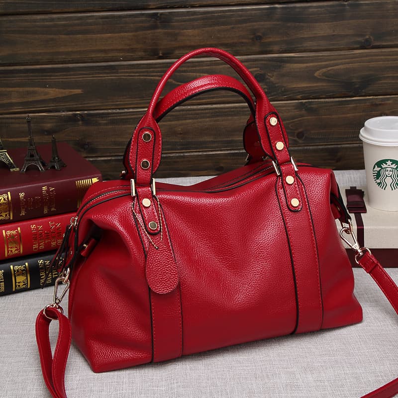 Bolso Boston retro con detalles de remaches