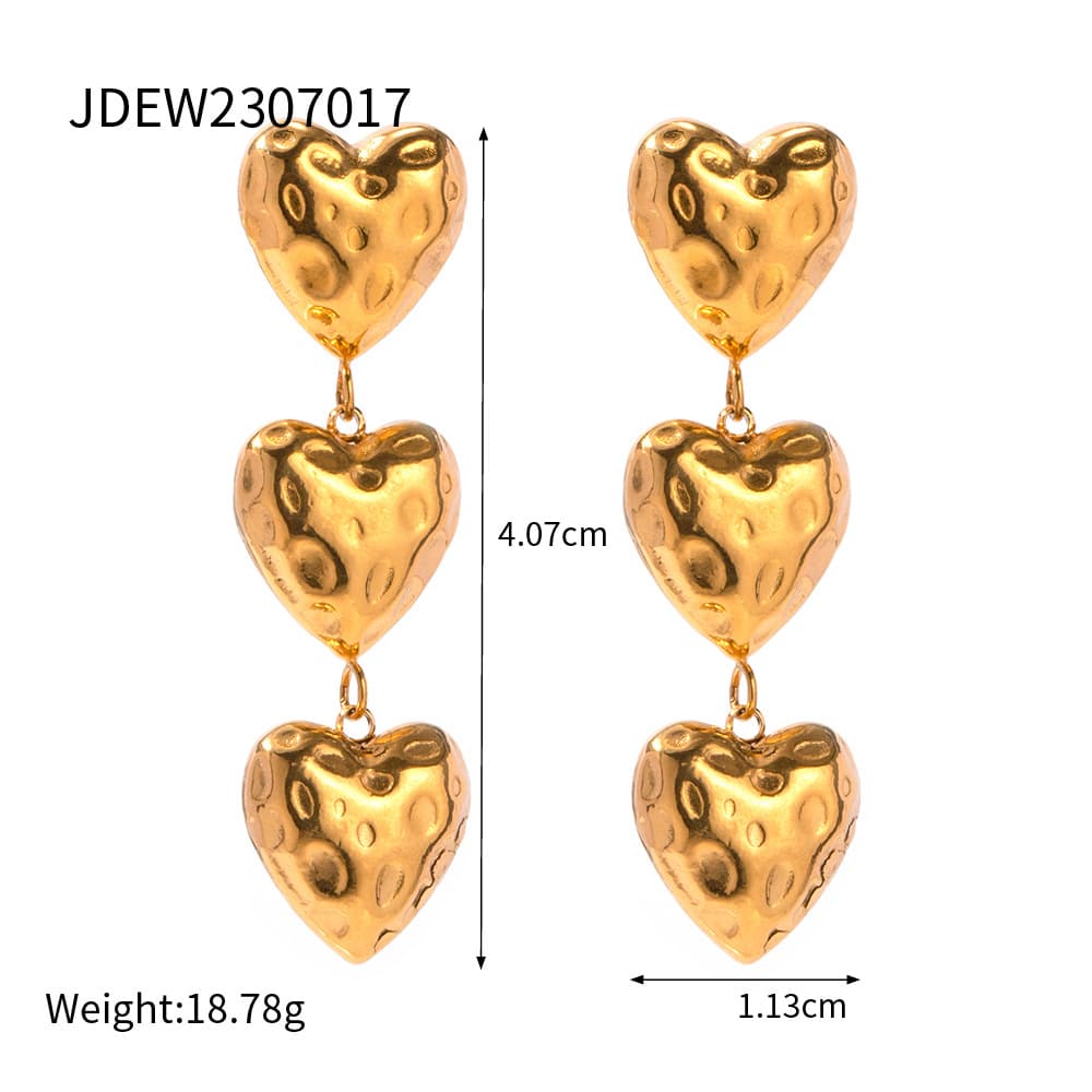 Aretes asimétricos de corazón estilo barroco