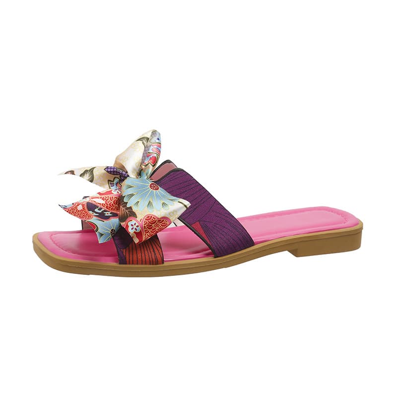 Sandalias de playa con moño y tacón bajo
