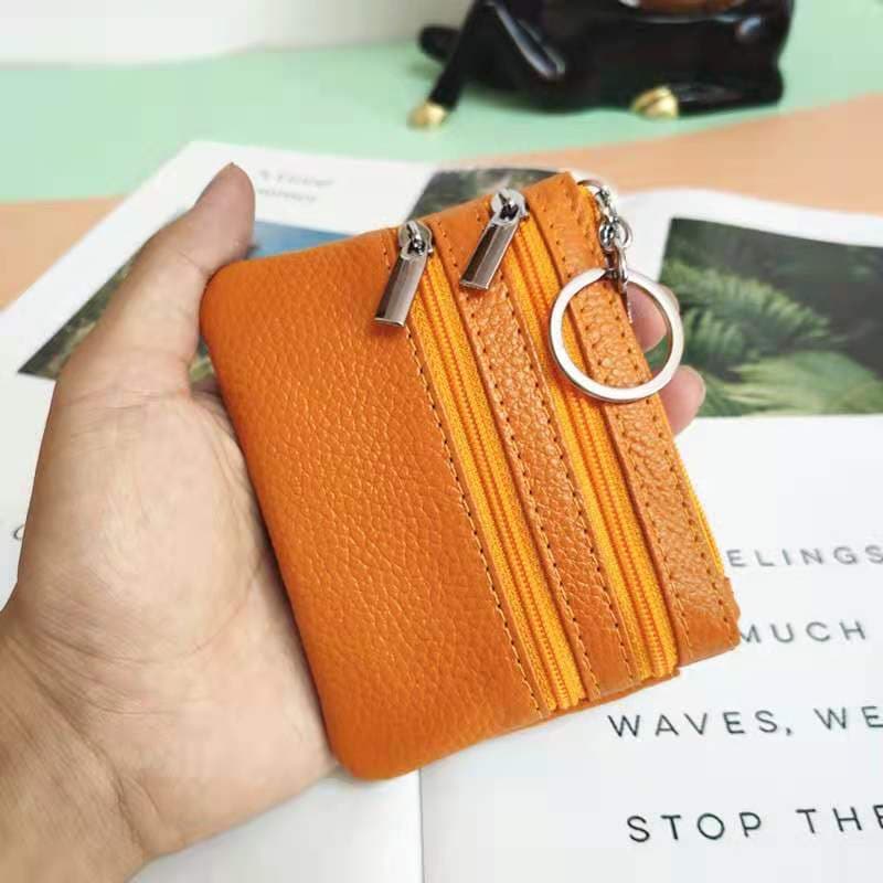Cartera de cuero sintético con doble cierre de cremallera