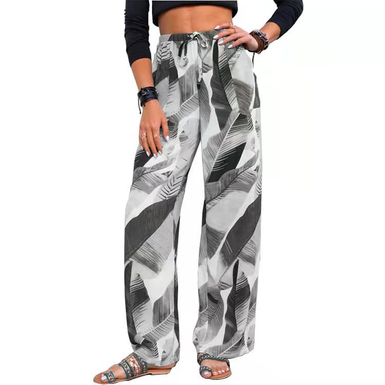 Pantalones playeros con estampado de hojas y cintura ajustable