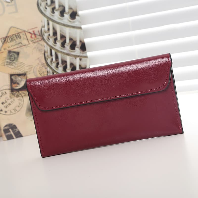 Cartera larga de cuero para mujer