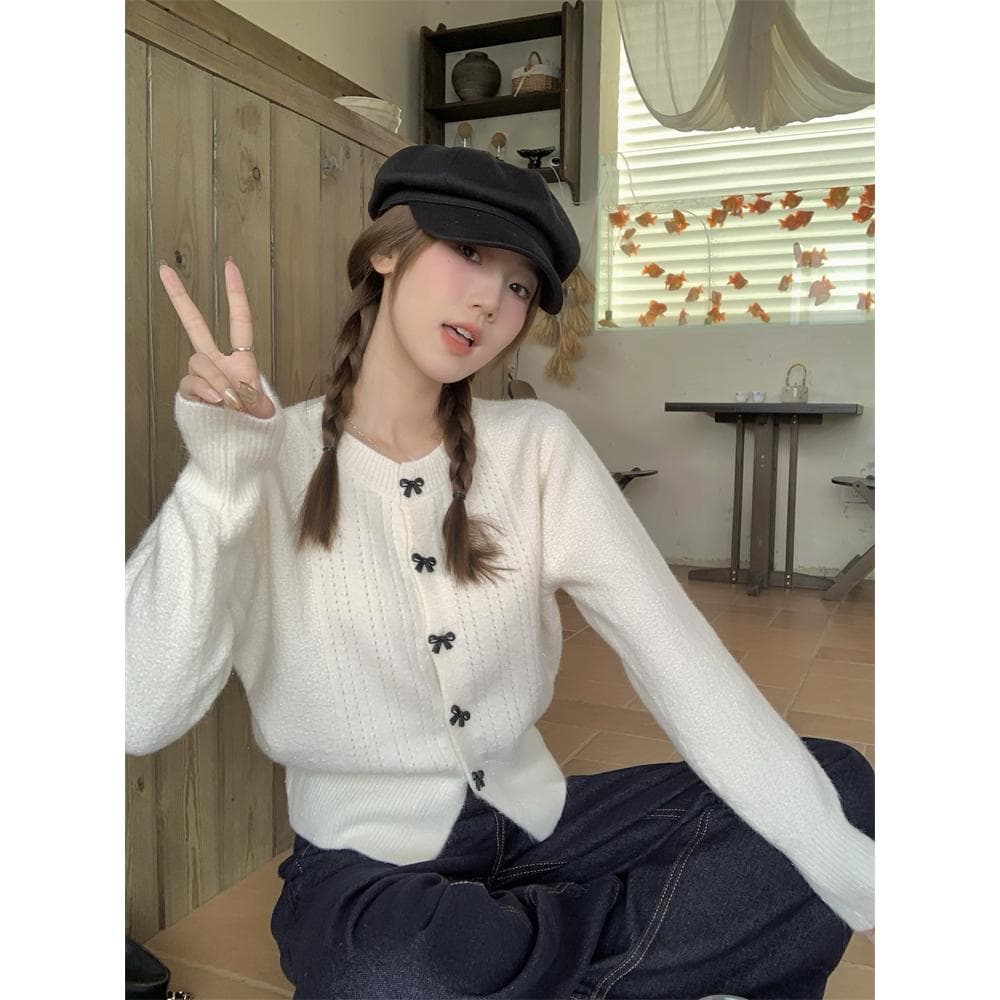 Cardigan corto de punto con lazo para mujer