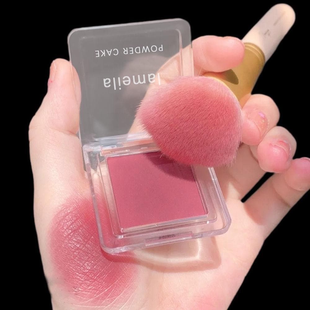 Maquillaje desnudo monograma tonos rojos naturales