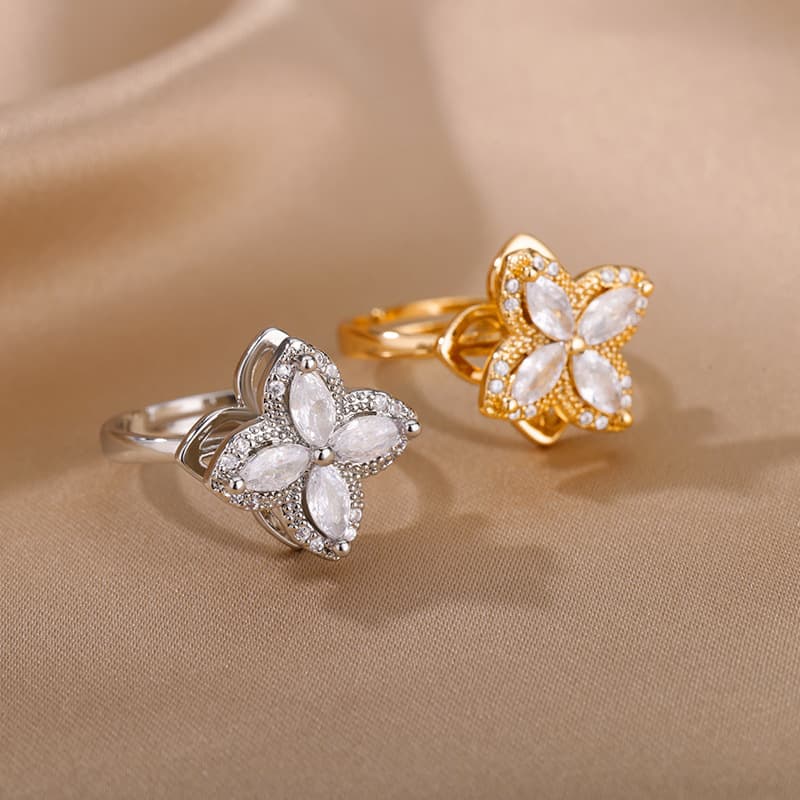 Anillo de flores giratorio con cristales de imitación