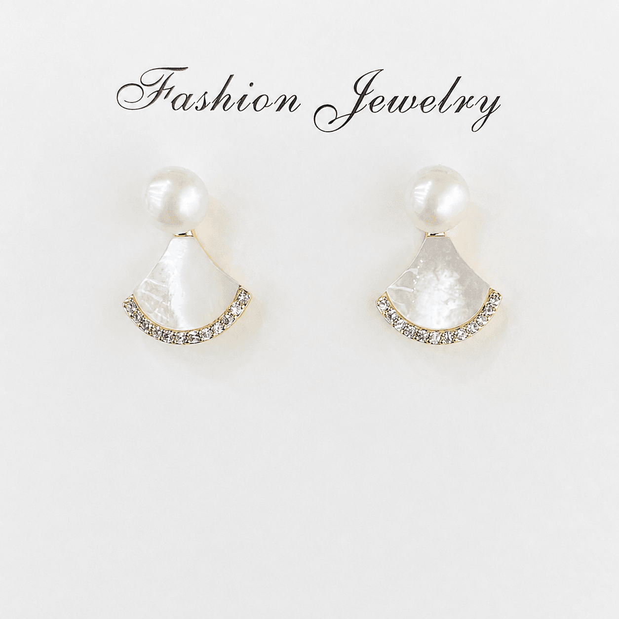 Aretes de perla con abanico de nácar